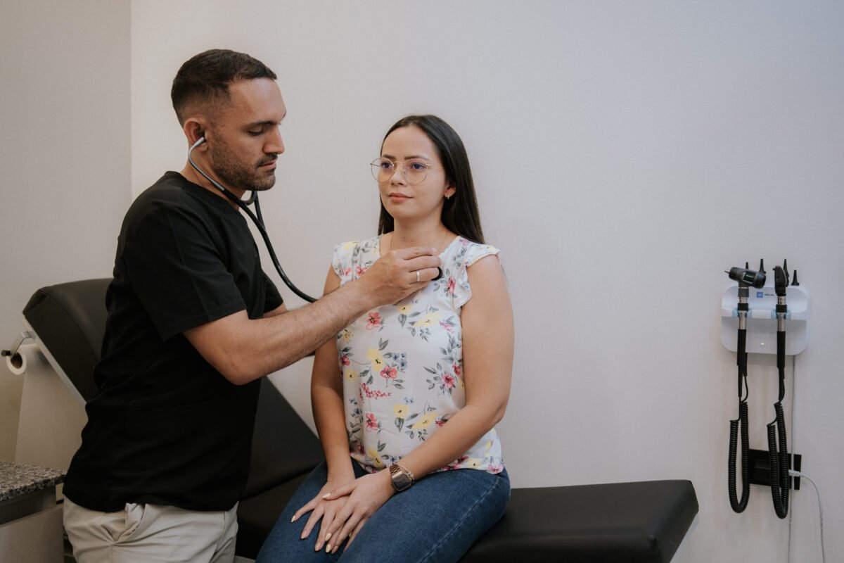 Doctor examining a patient with a stethoscope